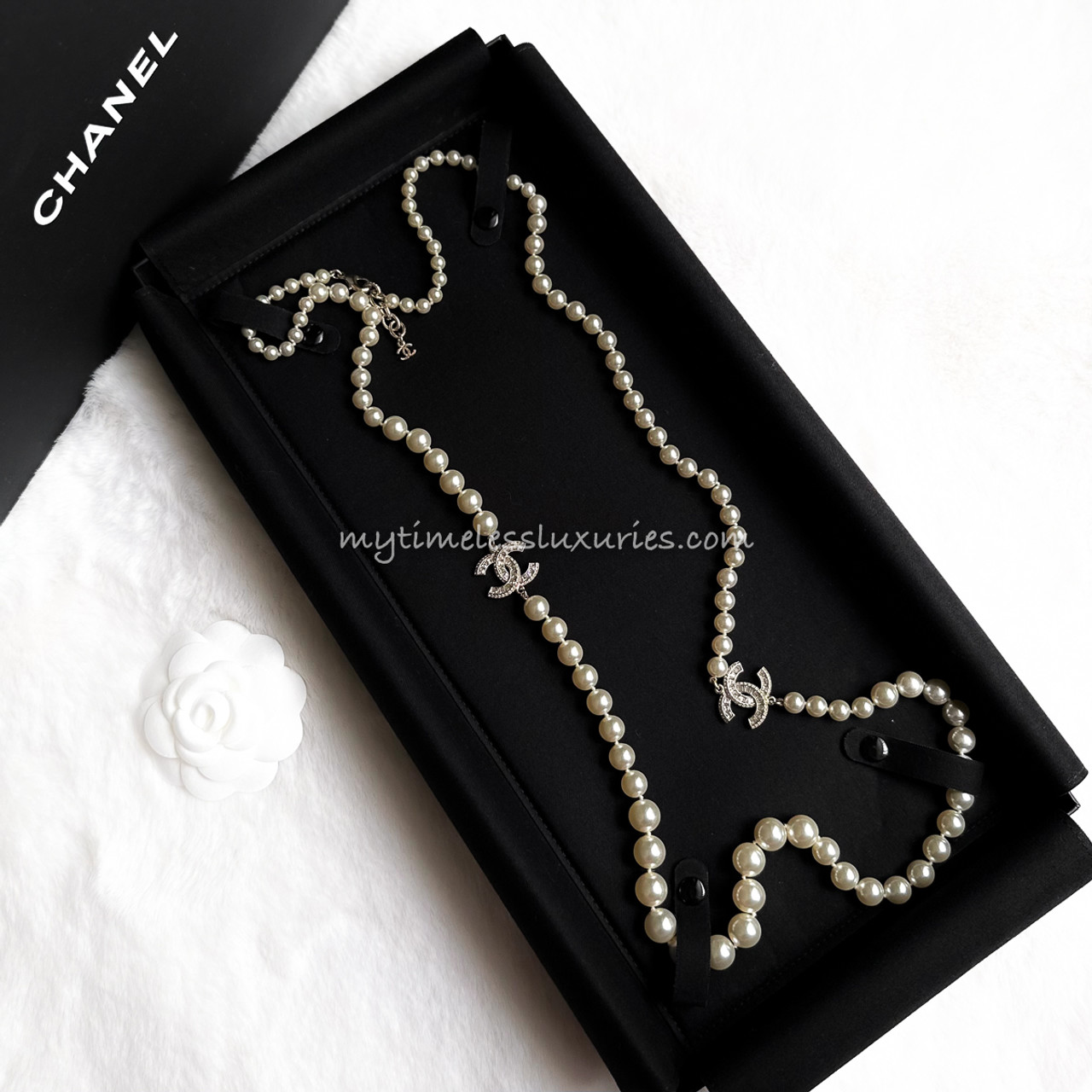 Chanel Long Pearl Necklace  DESIGNER TAKEAWAY BY QUEEN OF LUXURY BOUTIQUE  INC